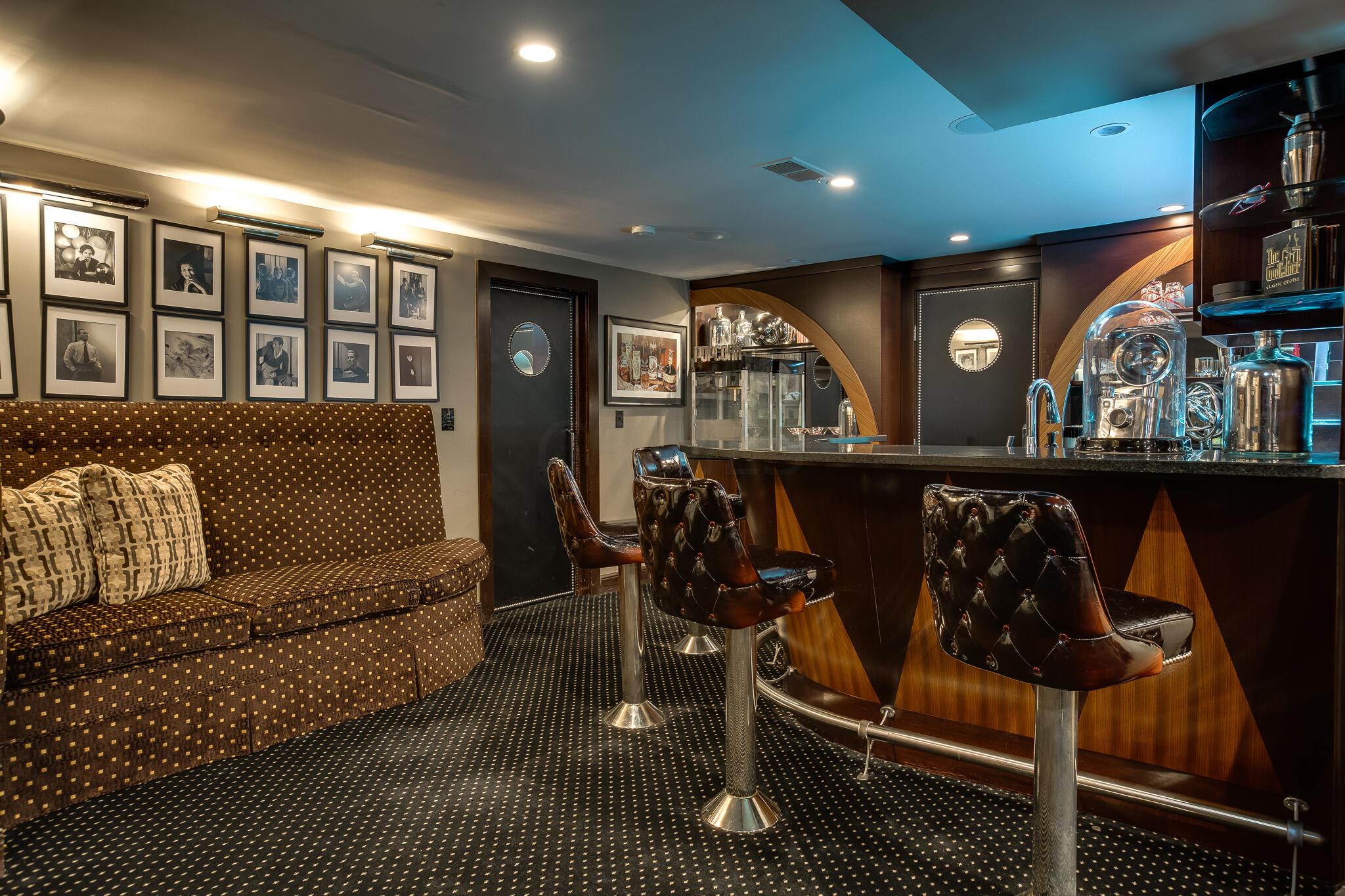 2252 Tremont Road Columbus, OH 43221 - Photo 72 of 97 Remodeled basement with stunning bar, sitting areas, and cinema seating with movie screen.