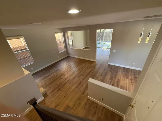 wooden floor with staircase