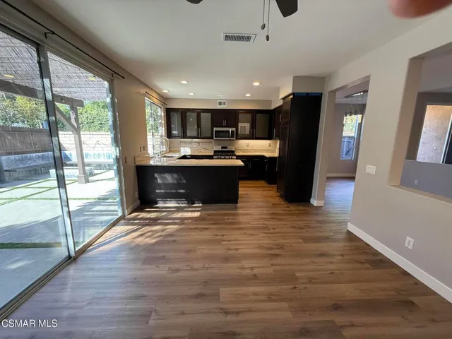 a view of kitchen and sink