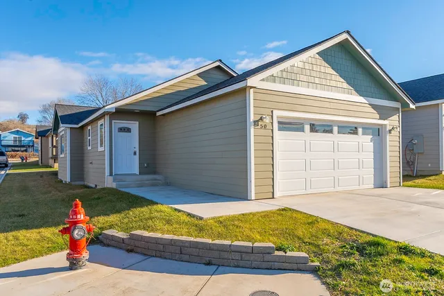 a front view of a house with yellow lighting