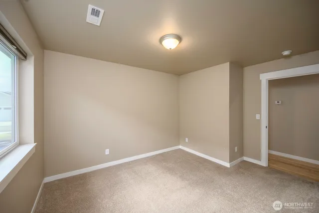 an empty room with a window