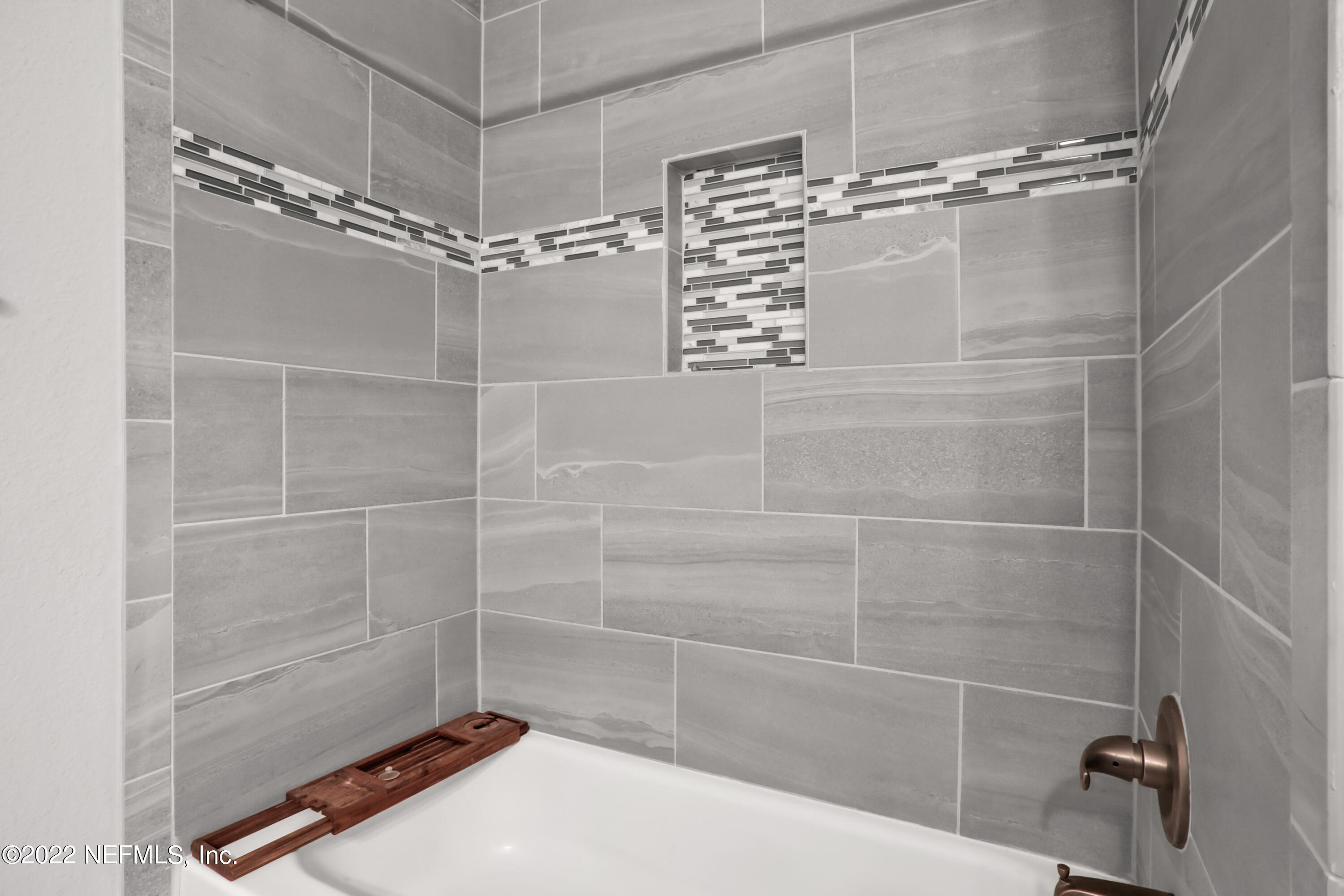 7507 Hilsdale Road Jacksonville, FL 32216 - Photo 28 of 38 a bathroom with a shower
