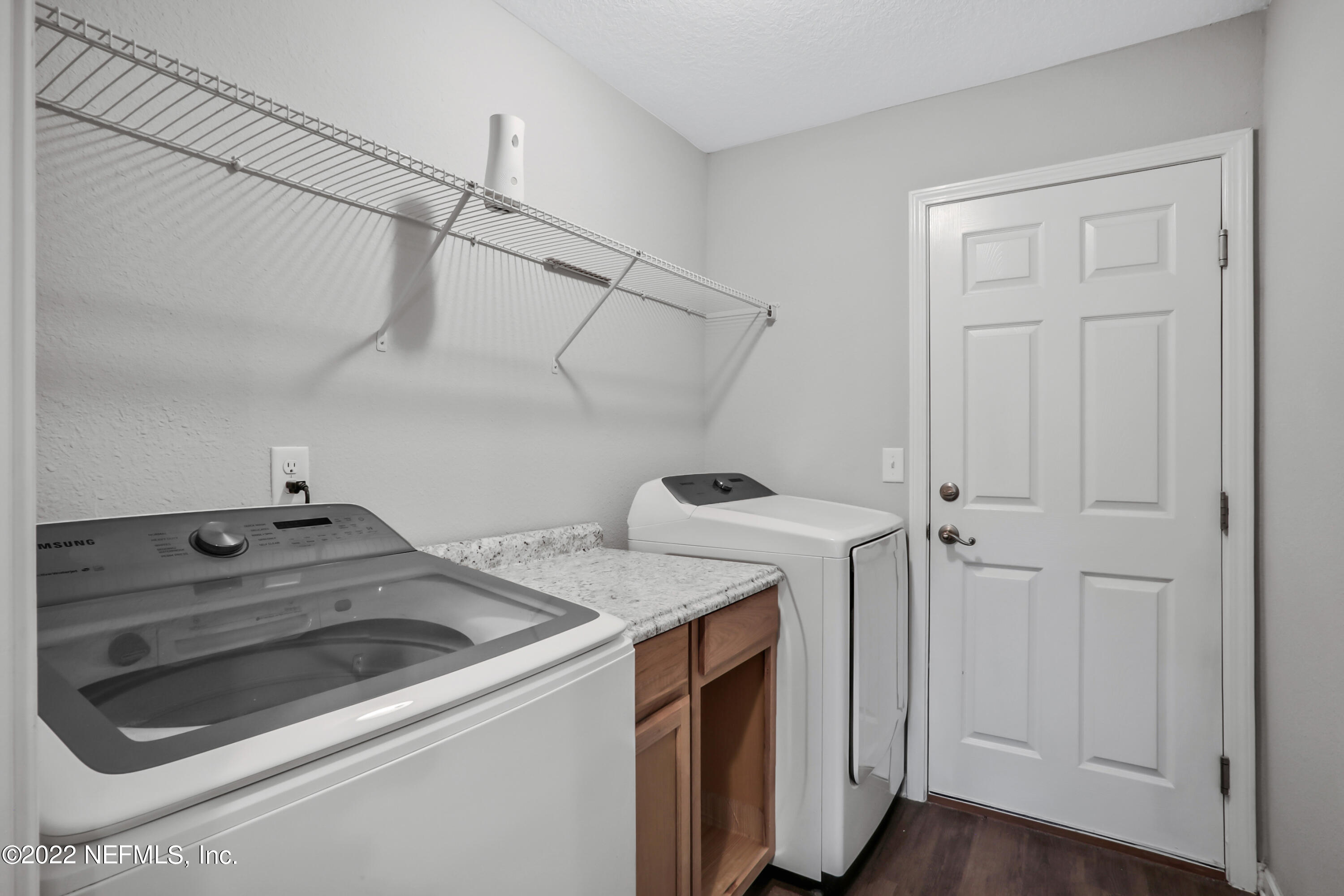 7507 Hilsdale Road Jacksonville, FL 32216 - Photo 31 of 38 a utility room with dryer and washer