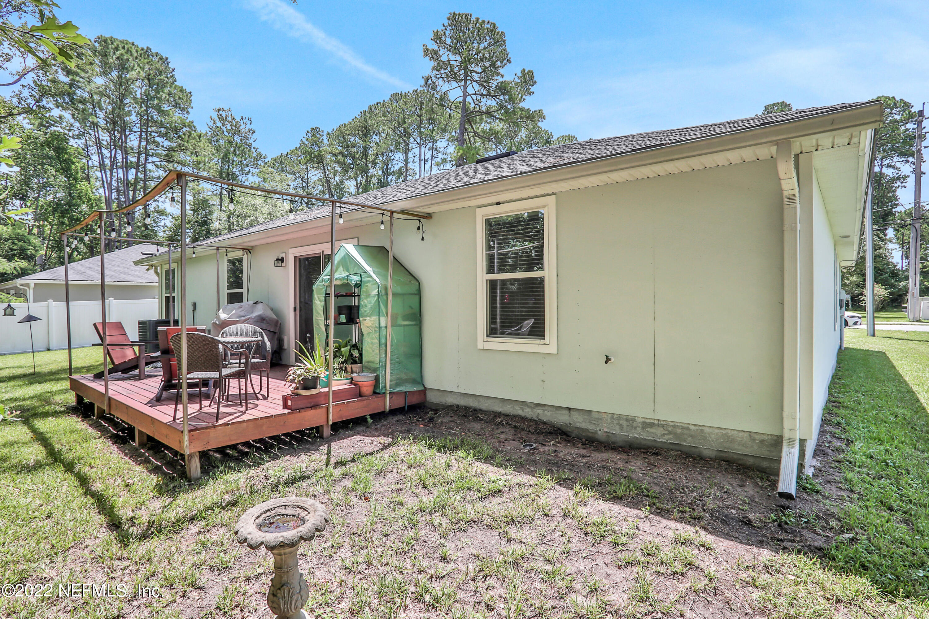 7507 Hilsdale Road Jacksonville, FL 32216 - Photo 35 of 38 a view of a house with wooden floor and roof