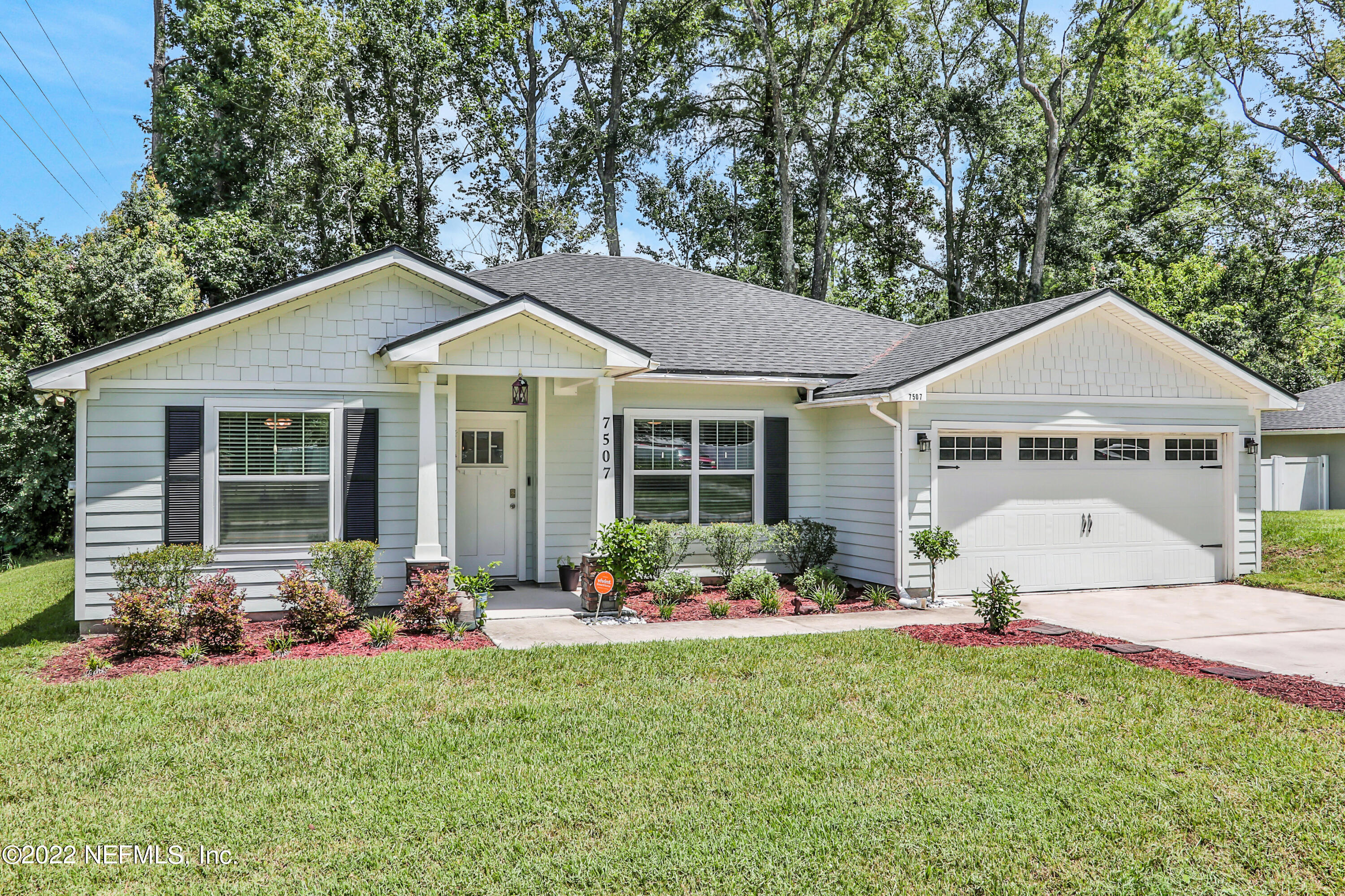 7507 Hilsdale Road Jacksonville, FL 32216 - Photo 38 of 38 a front view of a house with garden