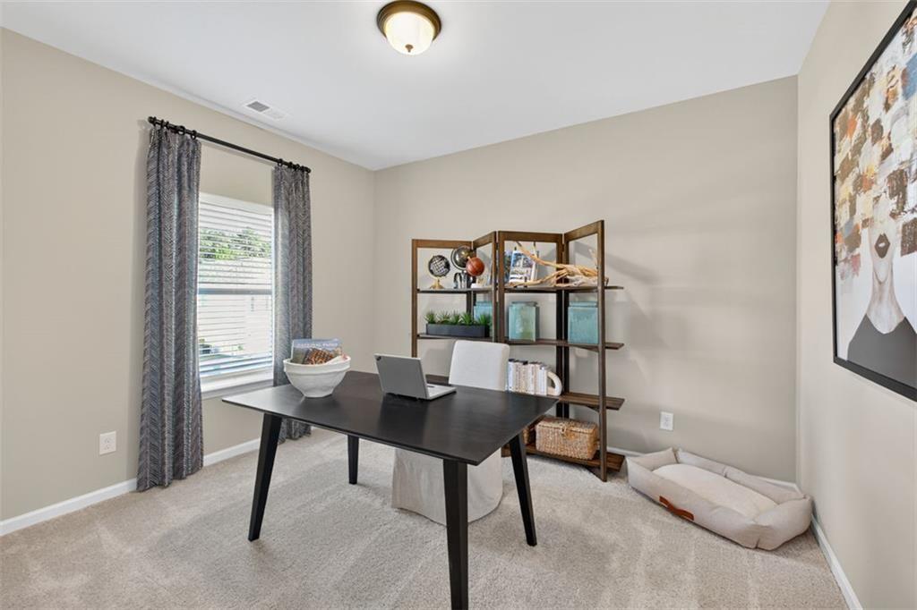 114 Andros Loop Dalton, GA 30721 - Photo 25 of 41 a workspace with furniture and a window