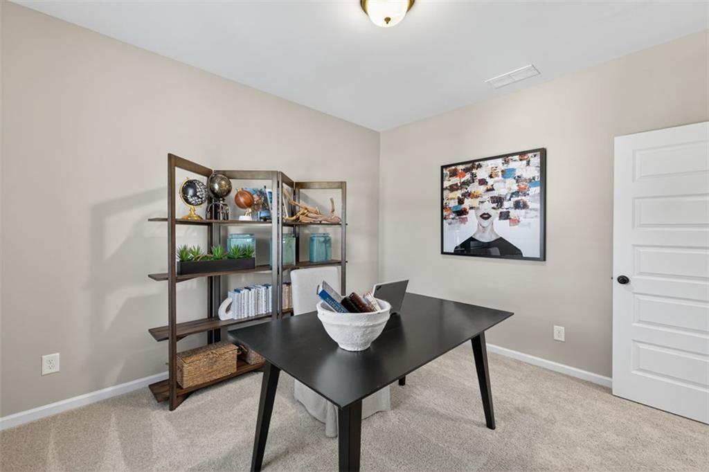 114 Andros Loop Dalton, GA 30721 - Photo 26 of 41 a view of a dining room with furniture