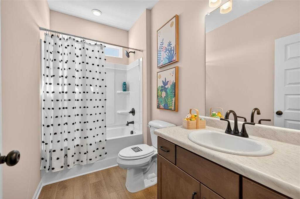 114 Andros Loop Dalton, GA 30721 - Photo 27 of 41 a bathroom with a sink toilet and shower