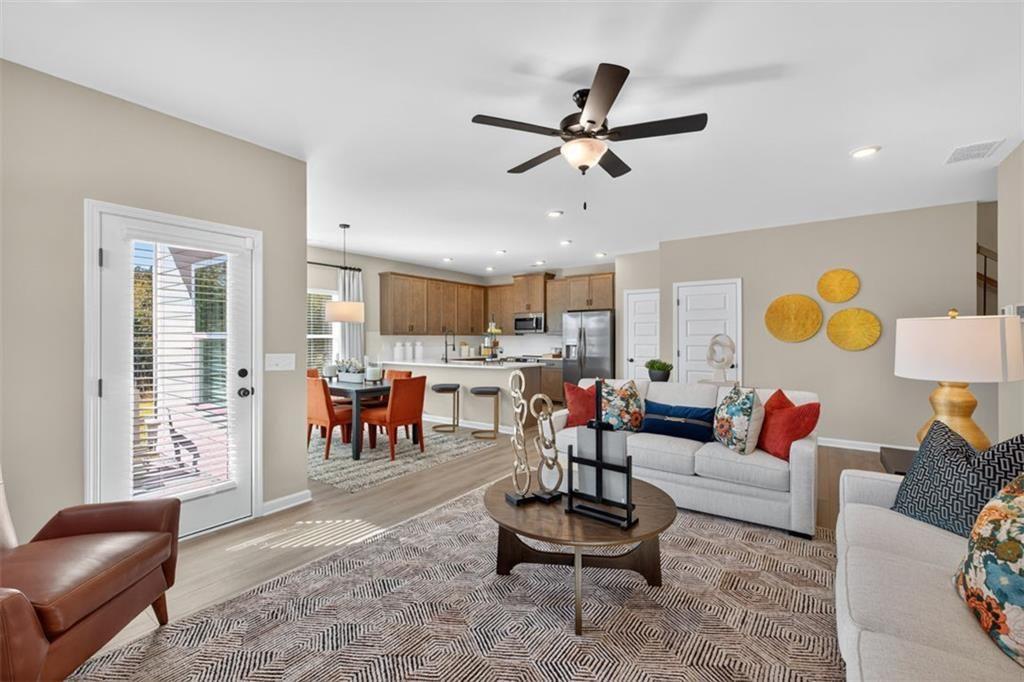 114 Andros Loop Dalton, GA 30721 - Photo 8 of 41 a living room with furniture and kitchen view