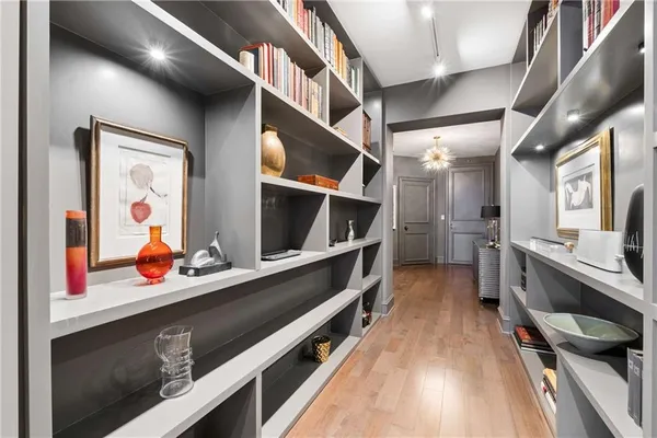 a kitchen with stainless steel appliances lots of counter space and a window