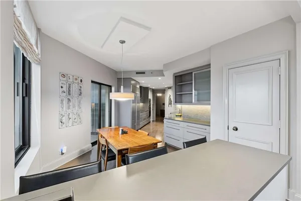 a bedroom with furniture and a window