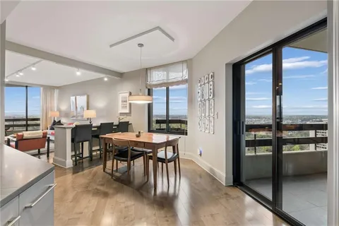 a view of a dining room with furniture