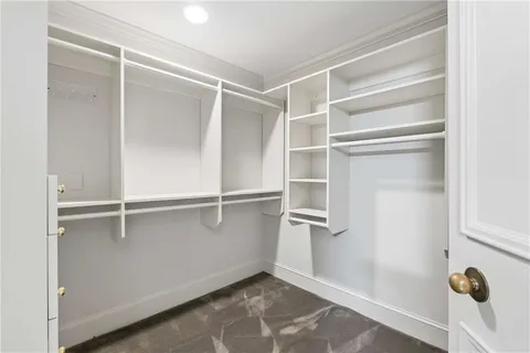 a view of an empty walk in closet