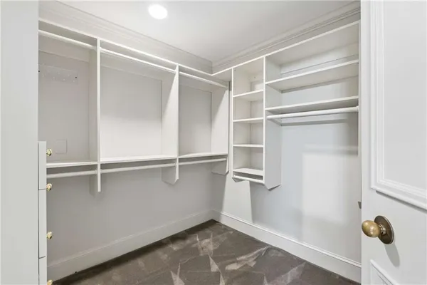 a view of an empty walk in closet