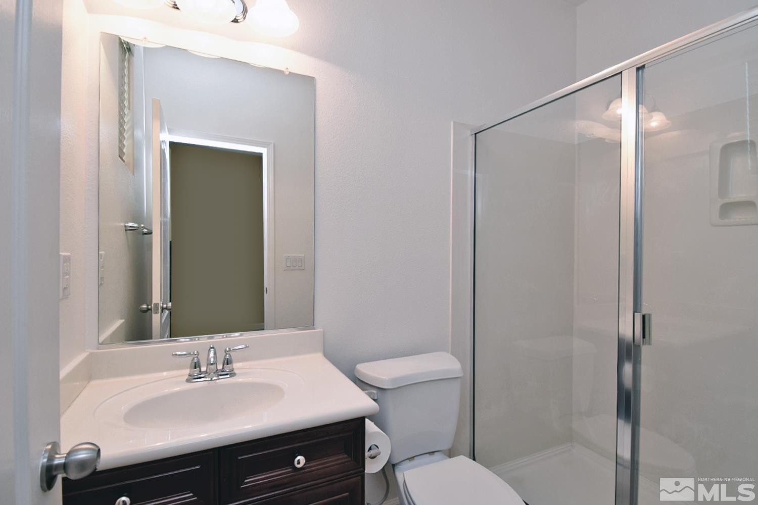 1955 Angel Ridge Drive Reno, NV 89521 - Photo 16 of 33 a bathroom with a sink toilet and shower