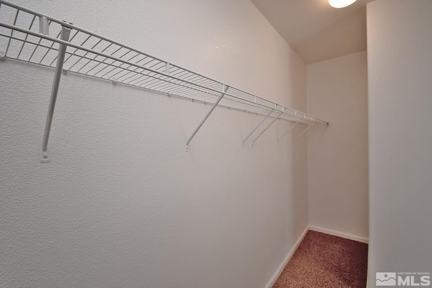 1955 Angel Ridge Drive Reno, NV 89521 - Photo 23 of 33 a view of a room with racks on the wall