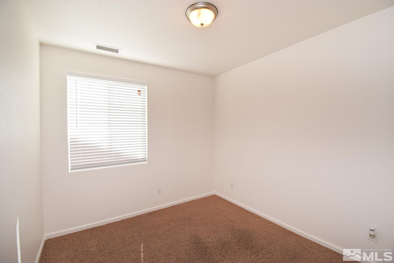1955 Angel Ridge Drive Reno, NV 89521 - Photo 25 of 33 a view of a small space with a window