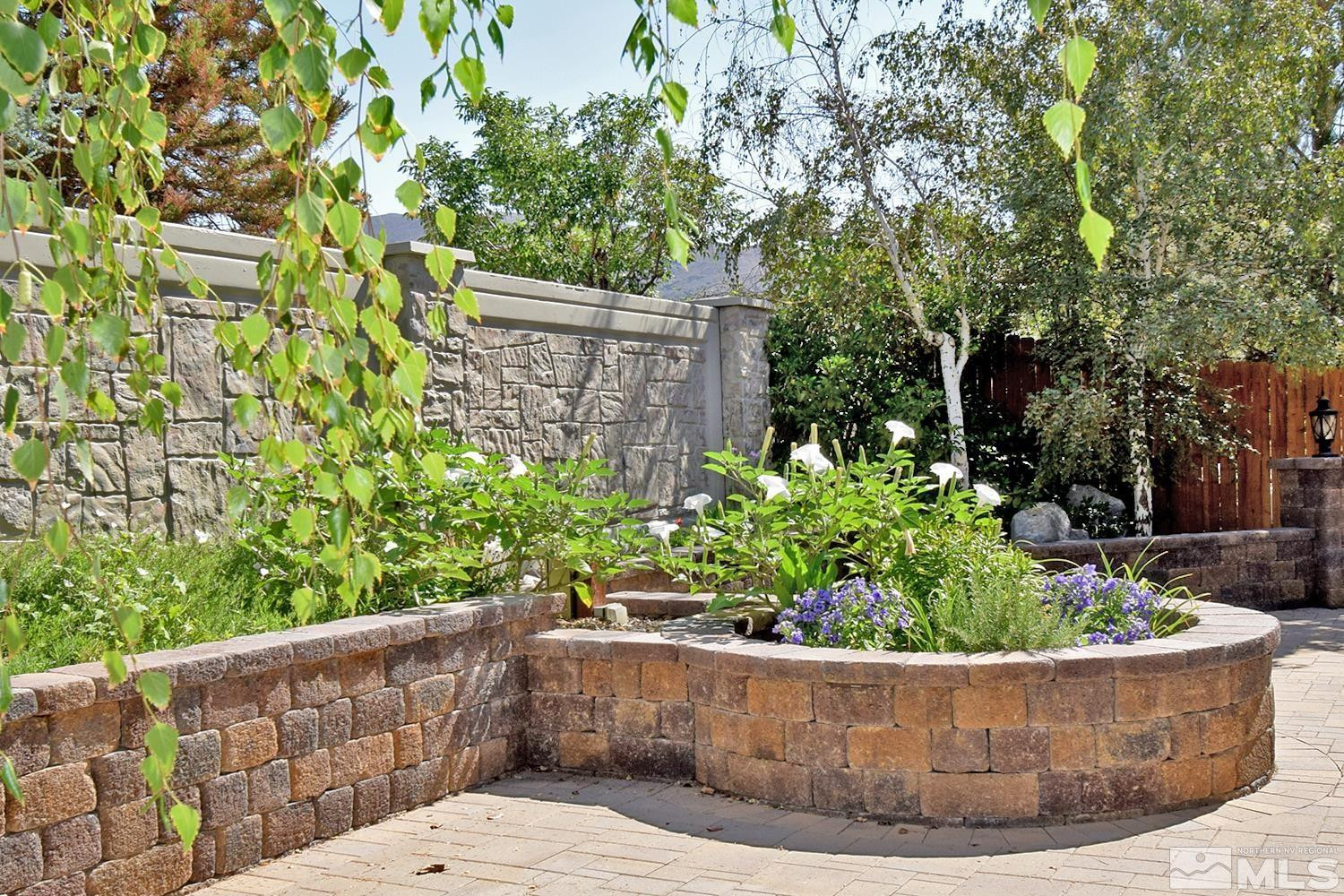 1955 Angel Ridge Drive Reno, NV 89521 - Photo 30 of 33 a view of a garden filled with lots of potted plants