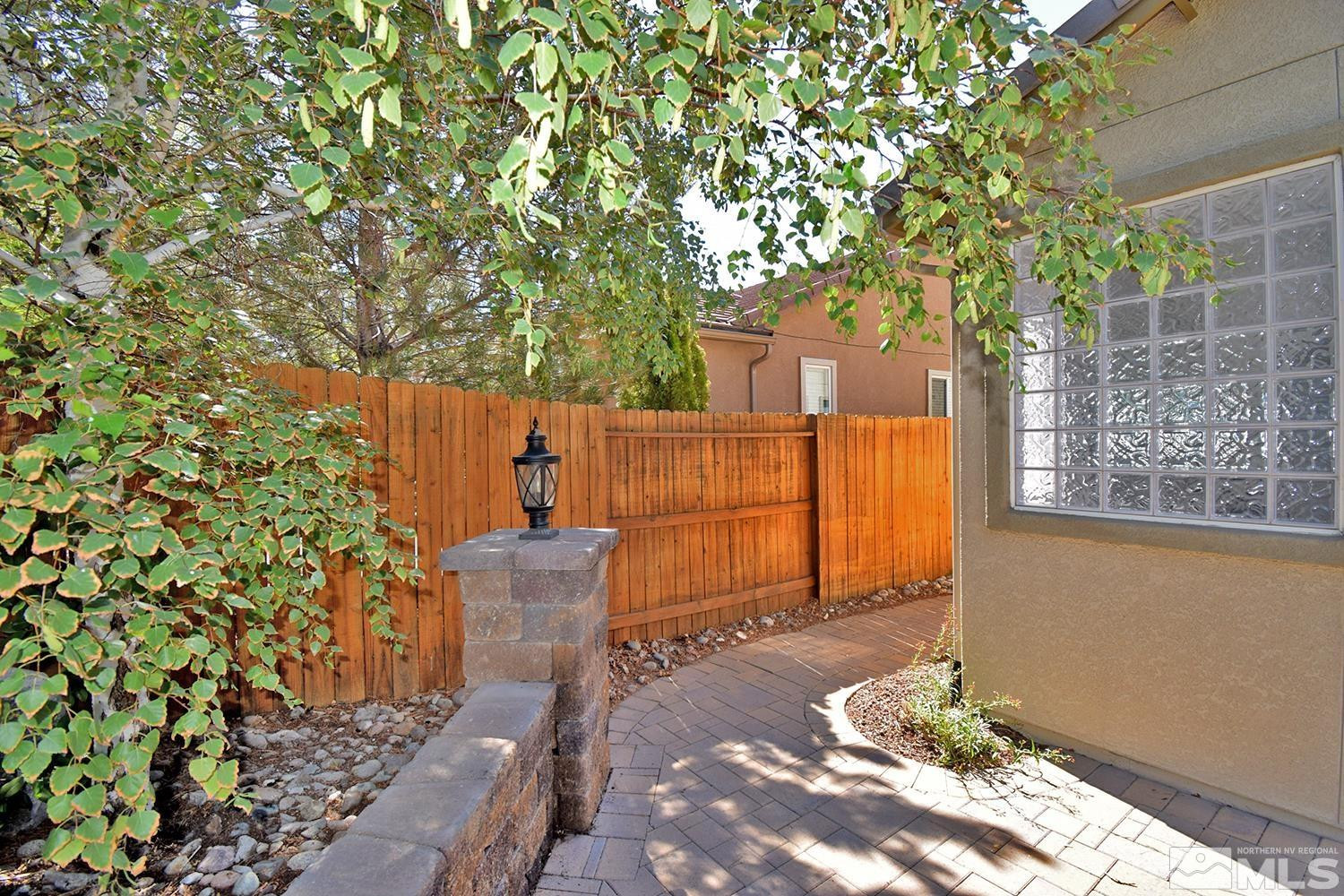 1955 Angel Ridge Drive Reno, NV 89521 - Photo 31 of 33 a backyard of a house with table and chairs