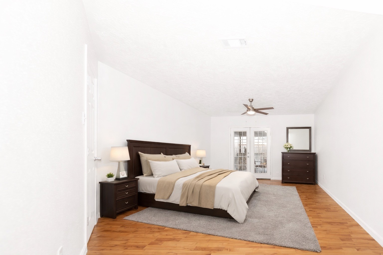 21734 Nickerton Lane Spring, TX 77388 - Photo 16 of 31 a bedroom with a bed and a couch