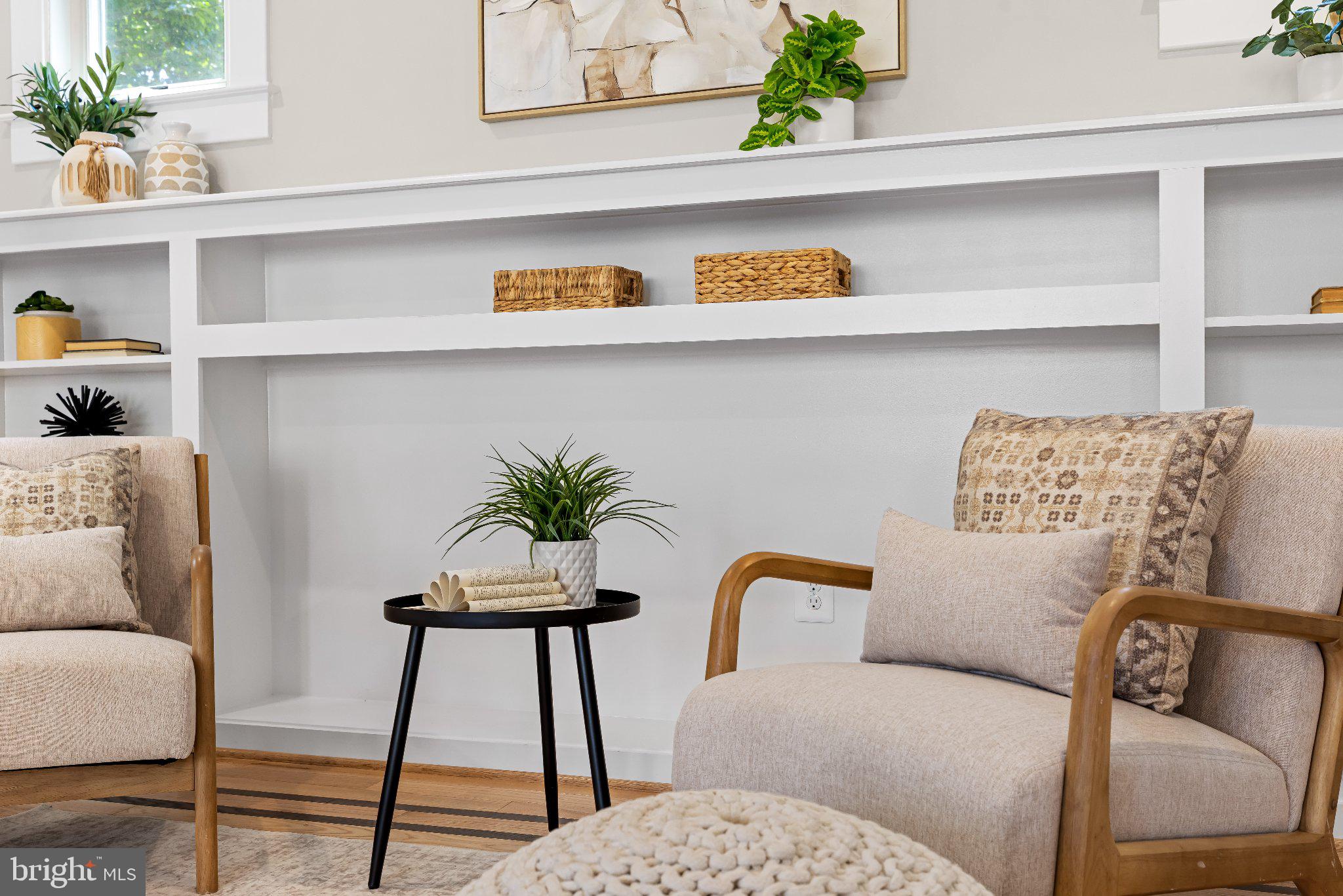 106 Sycamore Road Linthicum Heights, MD 21090 - Photo 11 of 51 a living room with a couch and potted plant