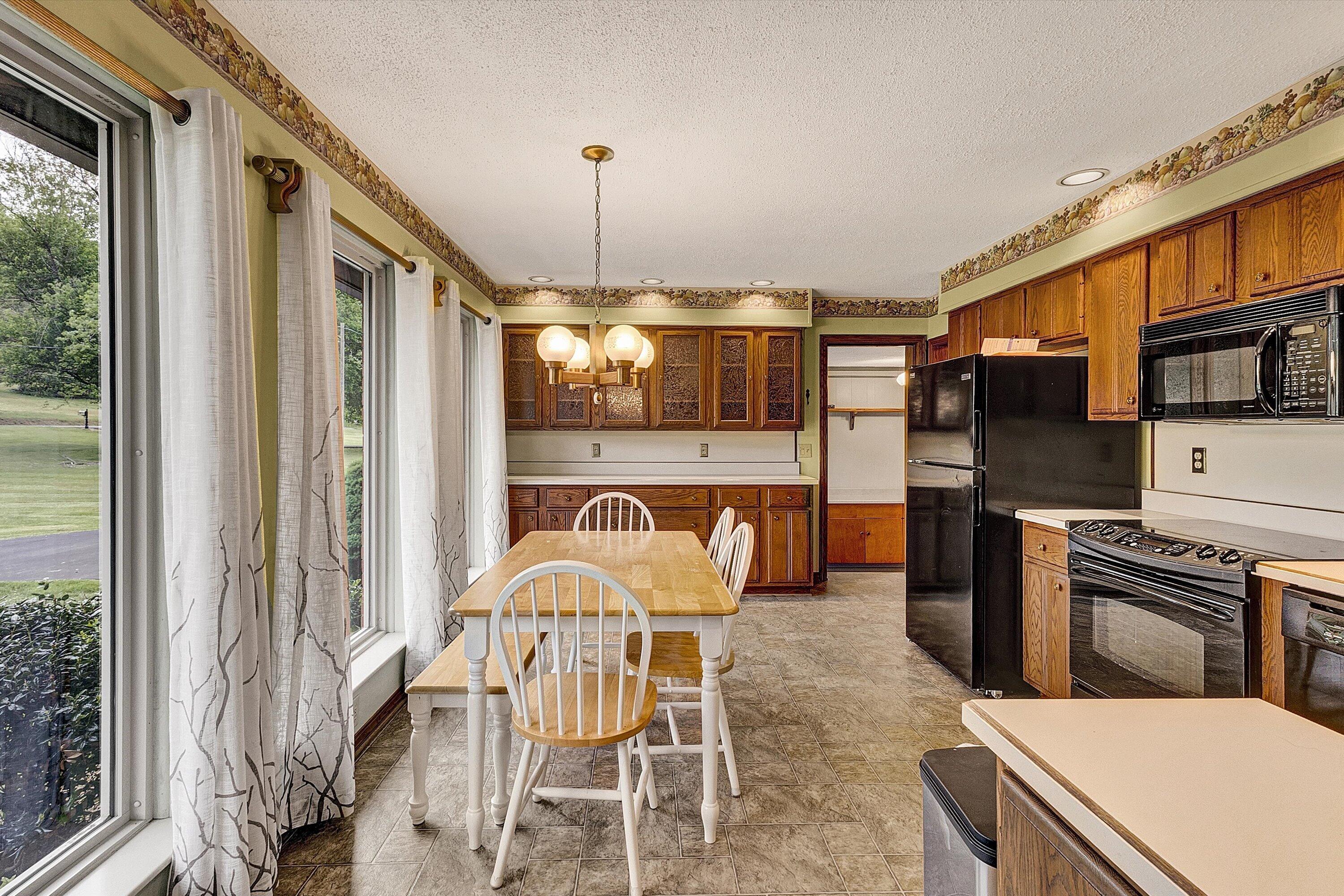 2015 Evergreen Road Covington, VA 24426 - Photo 14 of 46 a dining room with furniture and window