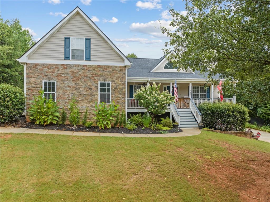 750 Sawdust Trail Nicholson, GA 30565 - Photo 1 of 1 a front view of house with yard and green space