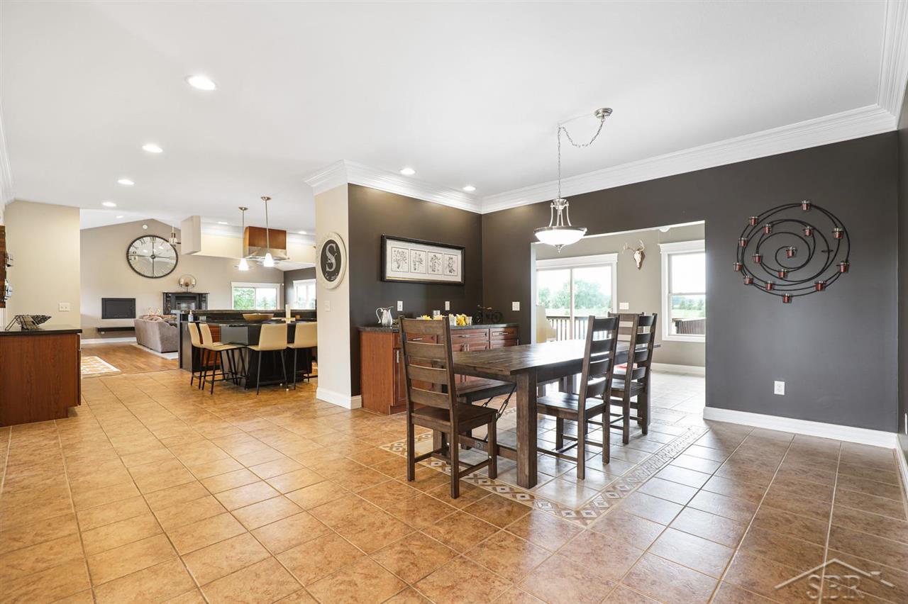 7256 7 Mile Road Freeland, MI 48623 - Photo 11 of 98 DINING ROOM LOOKING INTO KITCHEN