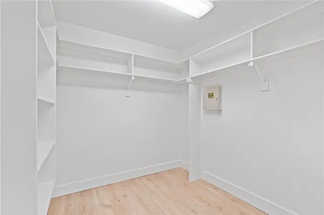 a view of an empty walk in closet