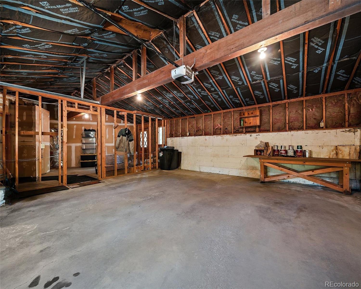 33913 Upper Bear Creek Road Evergreen, CO 80439 - Photo 36 of 45 a view of an empty room with stairs