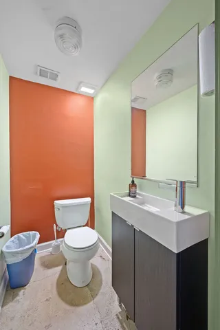 a street view with a building in the background