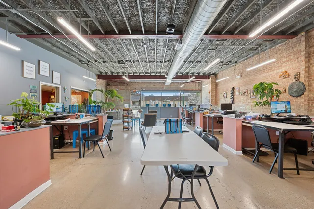 a view of a dining room with furniture window and outdoor kitchen