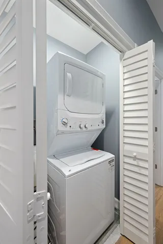 a bedroom with a bed and dresser