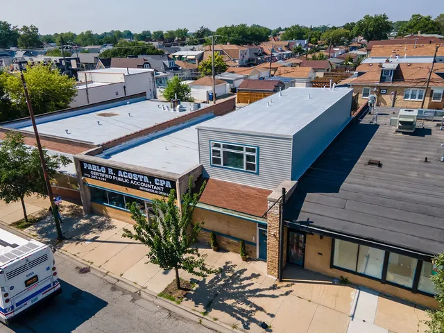a view of cars parked in a parking lot