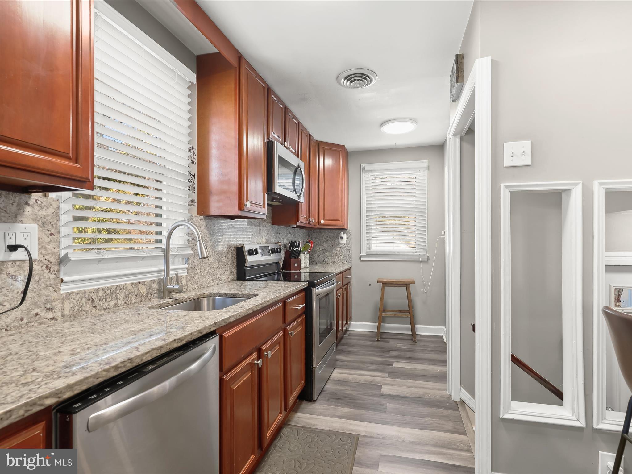 6716 Richardson Road Baltimore, MD 21207 - Photo 10 of 35 Kitchen with granite countertops