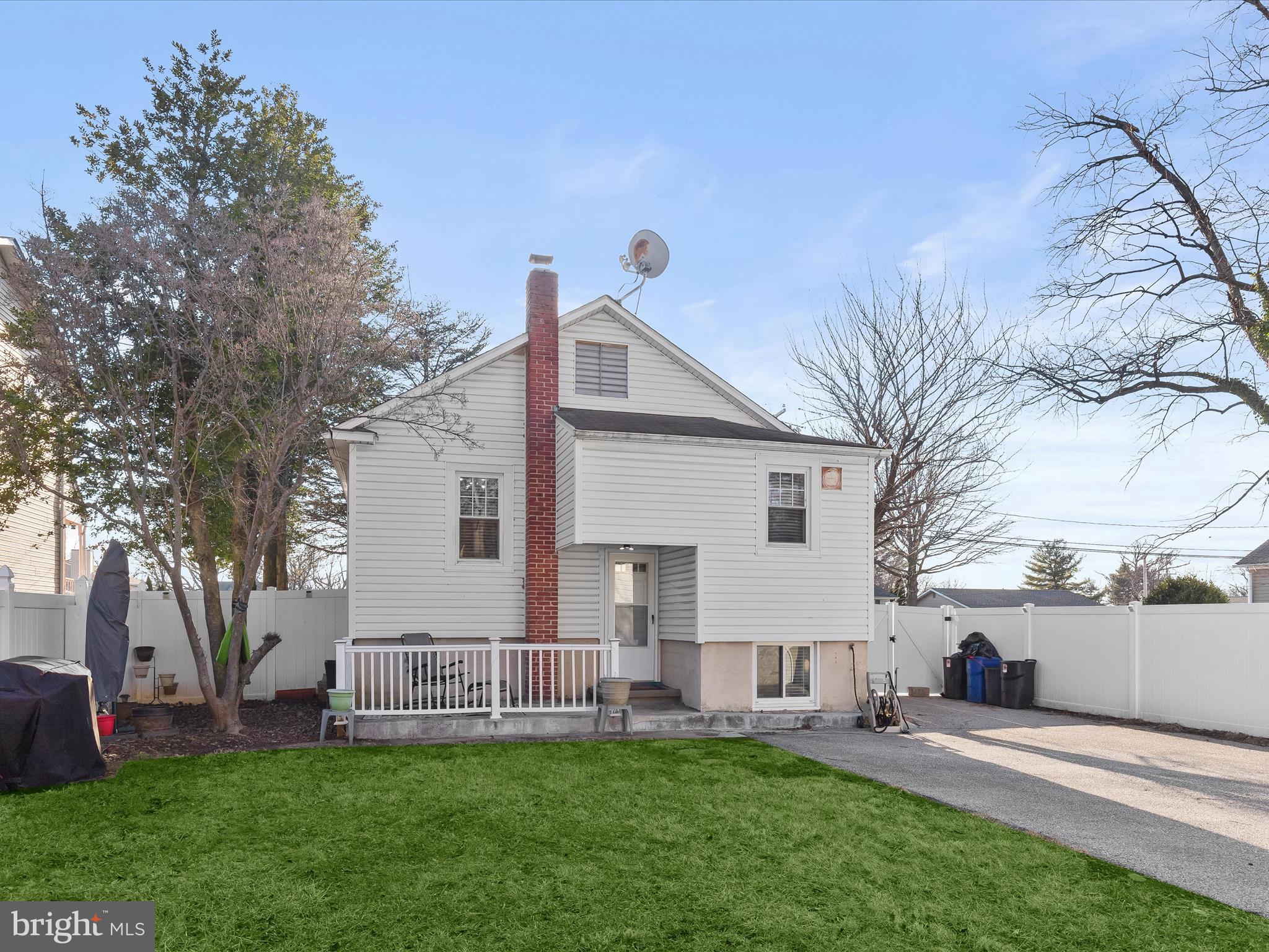 6716 Richardson Road Baltimore, MD 21207 - Photo 26 of 35 Rear exterior & abundant parking