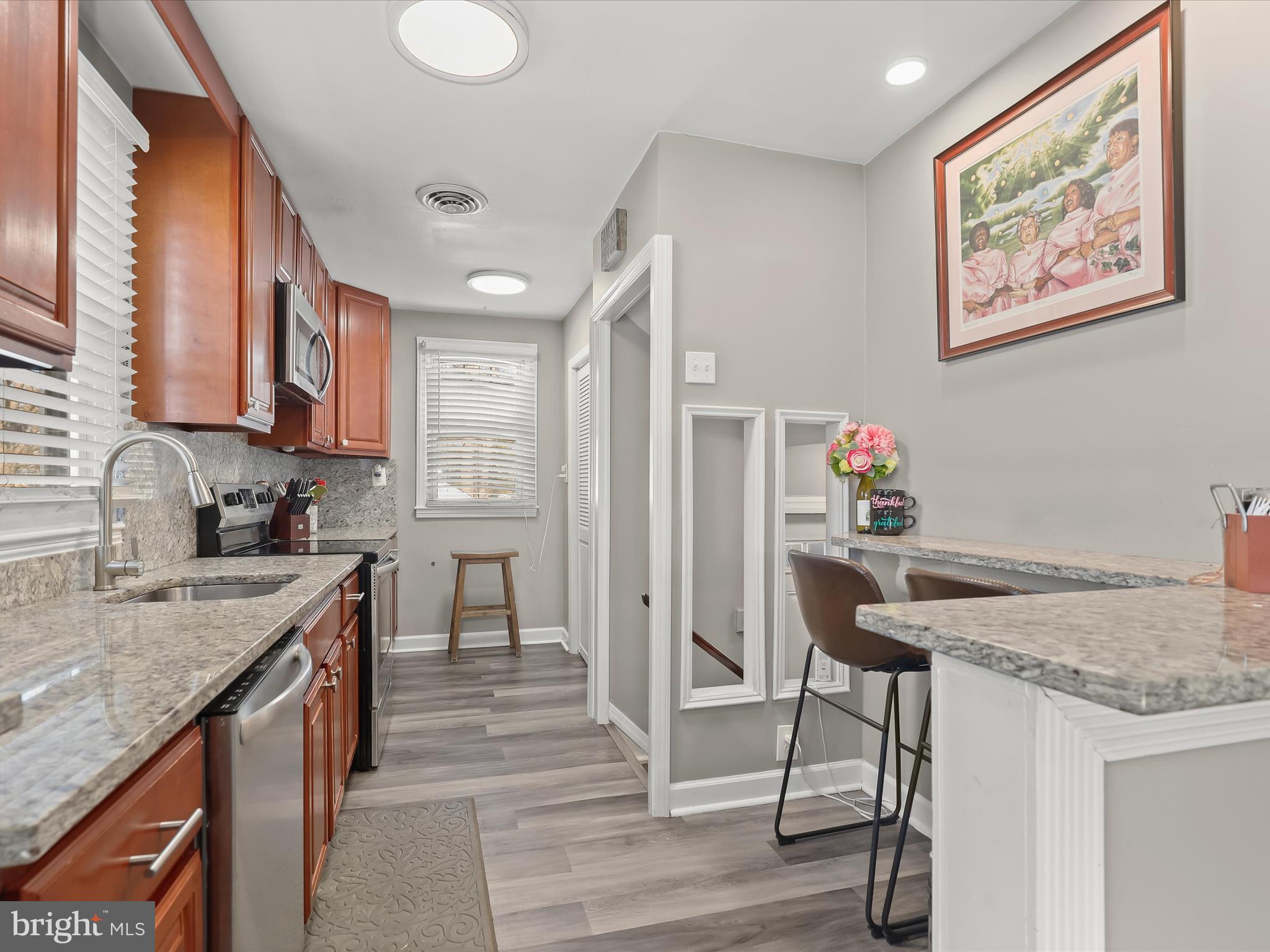 Updated granite kitchen with breakfast bar