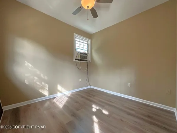 a view of a livingroom with a window