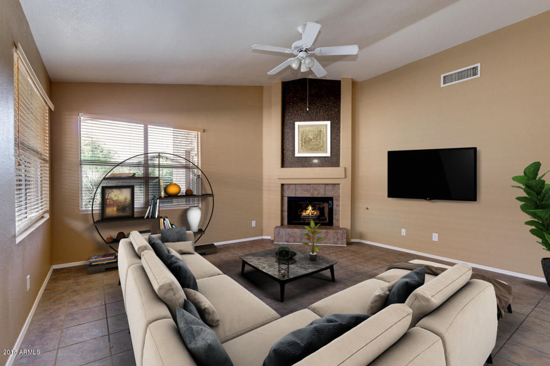 4711 East Jaeger Road Phoenix, AZ 85050 - Photo 17 of 41 Family room virtually staged