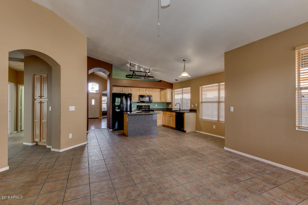 4711 East Jaeger Road Phoenix, AZ 85050 - Photo 22 of 41 View of kitchen and corridor from family