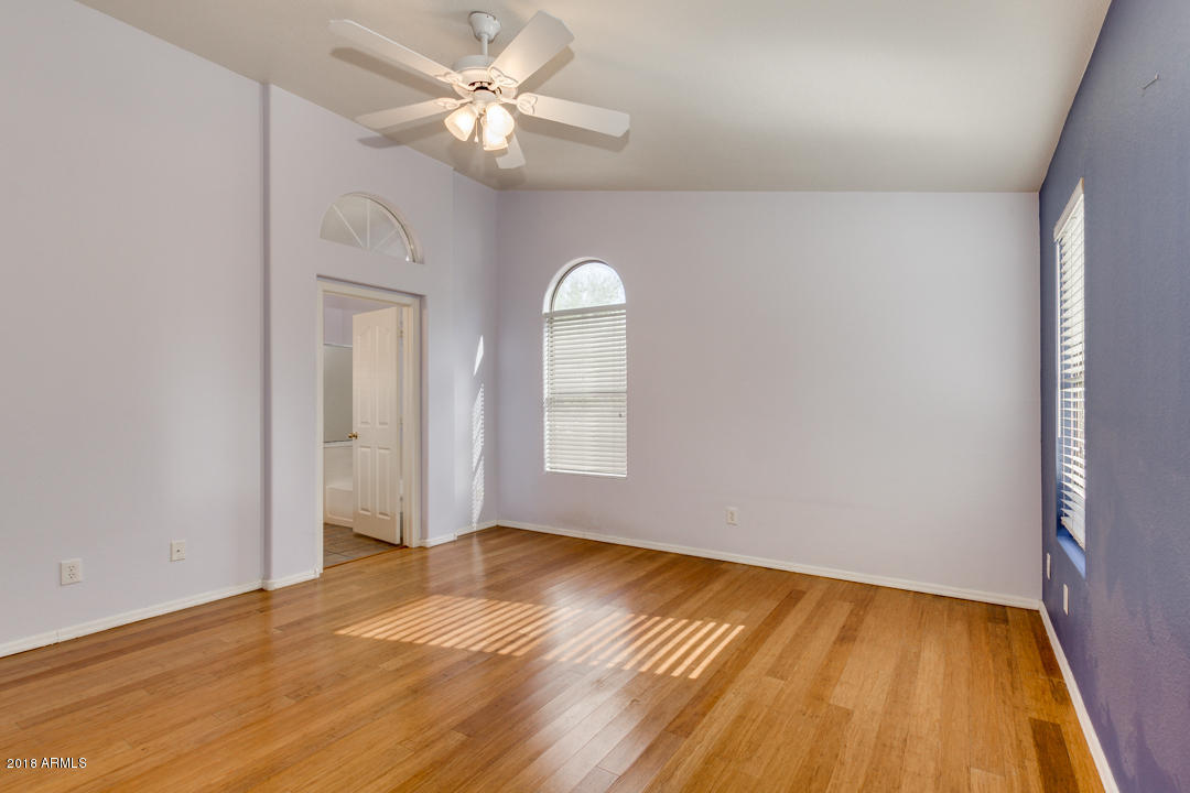 4711 East Jaeger Road Phoenix, AZ 85050 - Photo 25 of 41 Master bedroom with natural light and ma