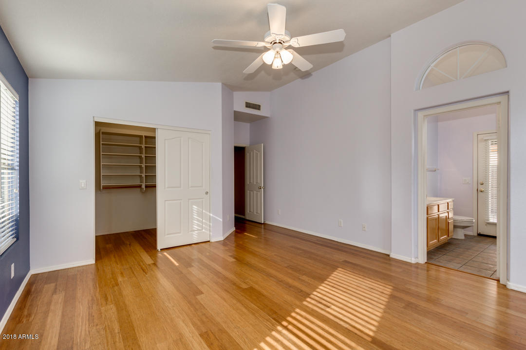 4711 East Jaeger Road Phoenix, AZ 85050 - Photo 26 of 41 Master bedroom with walk in closet