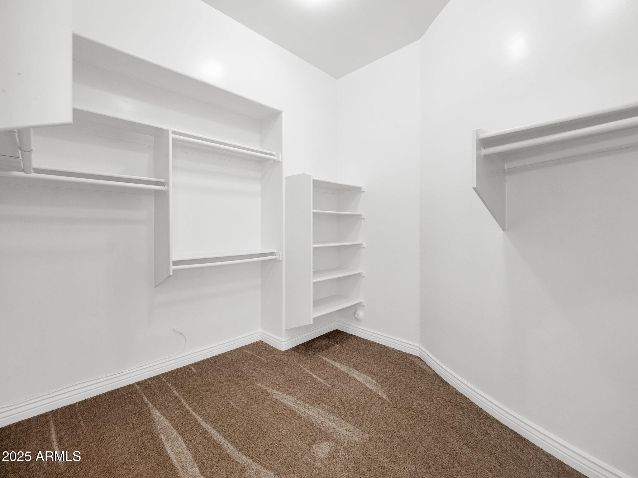 28 East Joseph Way Gilbert, AZ 85295 - Photo 28 of 54 a view of an empty walk in closet