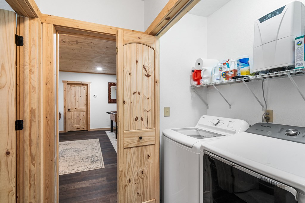 482 Tsalagi Trail Murphy, NC 28906 - Photo 18 of 44 a utility room with dryer and washer