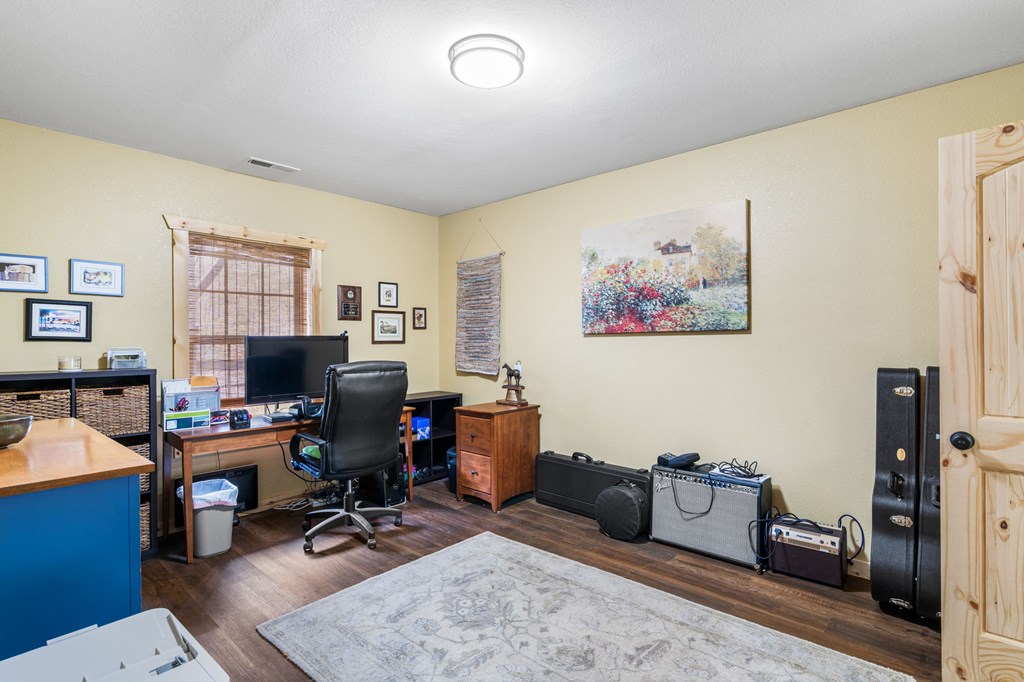 482 Tsalagi Trail Murphy, NC 28906 - Photo 21 of 44 a view of a workspace with furniture and a window