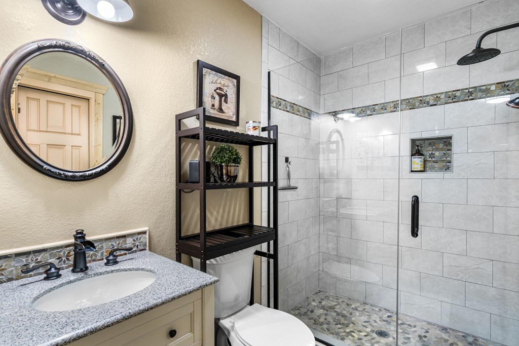 482 Tsalagi Trail Murphy, NC 28906 - Photo 23 of 44 a bathroom with a sink and a mirror