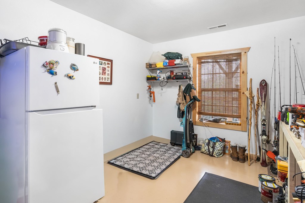 482 Tsalagi Trail Murphy, NC 28906 - Photo 24 of 44 a view of room with toys and wooden floor