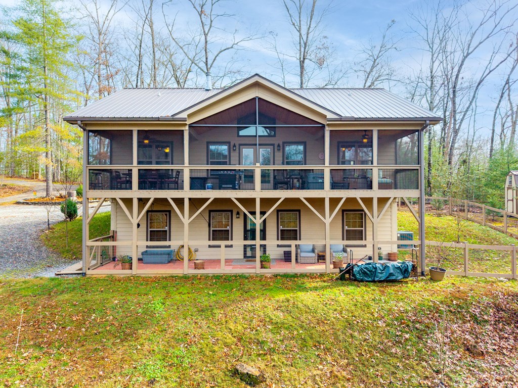 482 Tsalagi Trail Murphy, NC 28906 - Photo 29 of 44 a view of a house with pool and chairs
