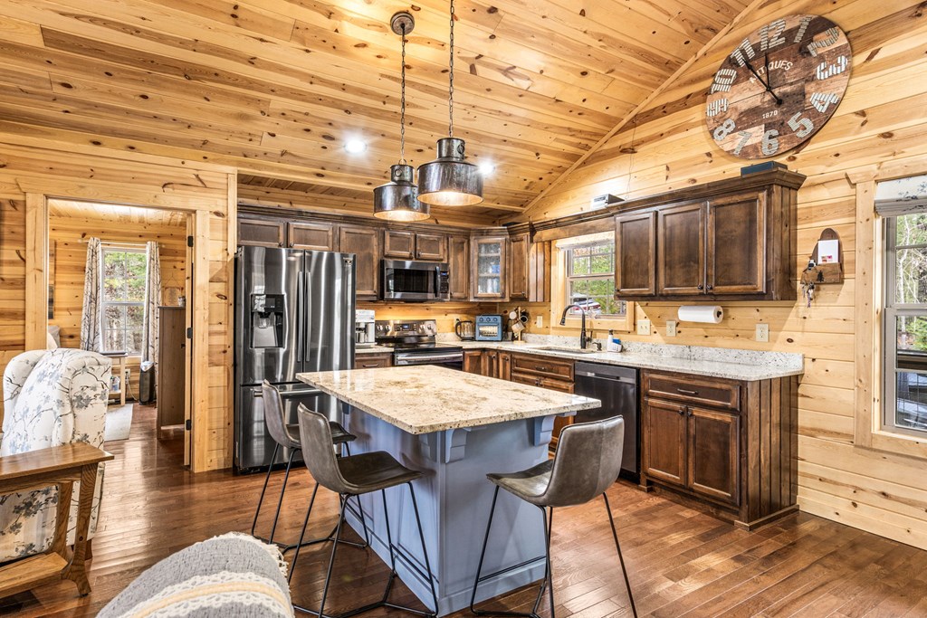 482 Tsalagi Trail Murphy, NC 28906 - Photo 7 of 44 a large kitchen with a table and chairs