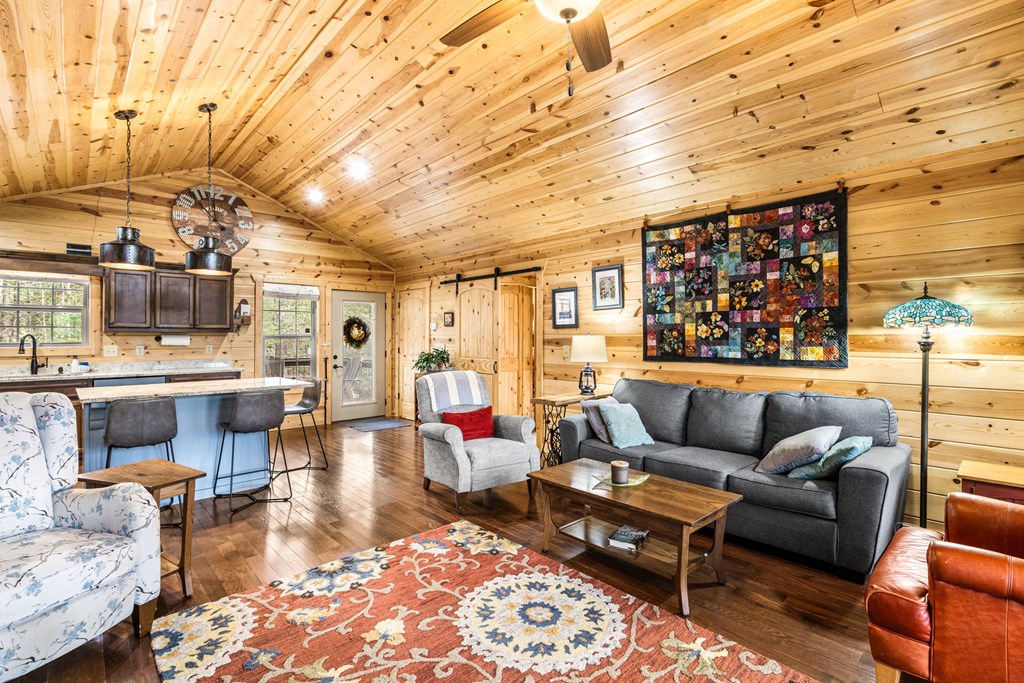 482 Tsalagi Trail Murphy, NC 28906 - Photo 10 of 44 a living room with furniture and a rug